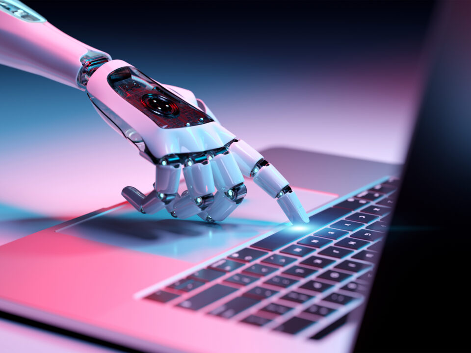 AI-powered personalisation technology with robotic hand on laptop representing digital marketing automation in South Africa