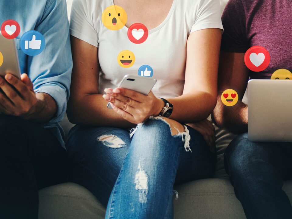 South Africans engaging with social media on mobile devices showing the future of social platforms